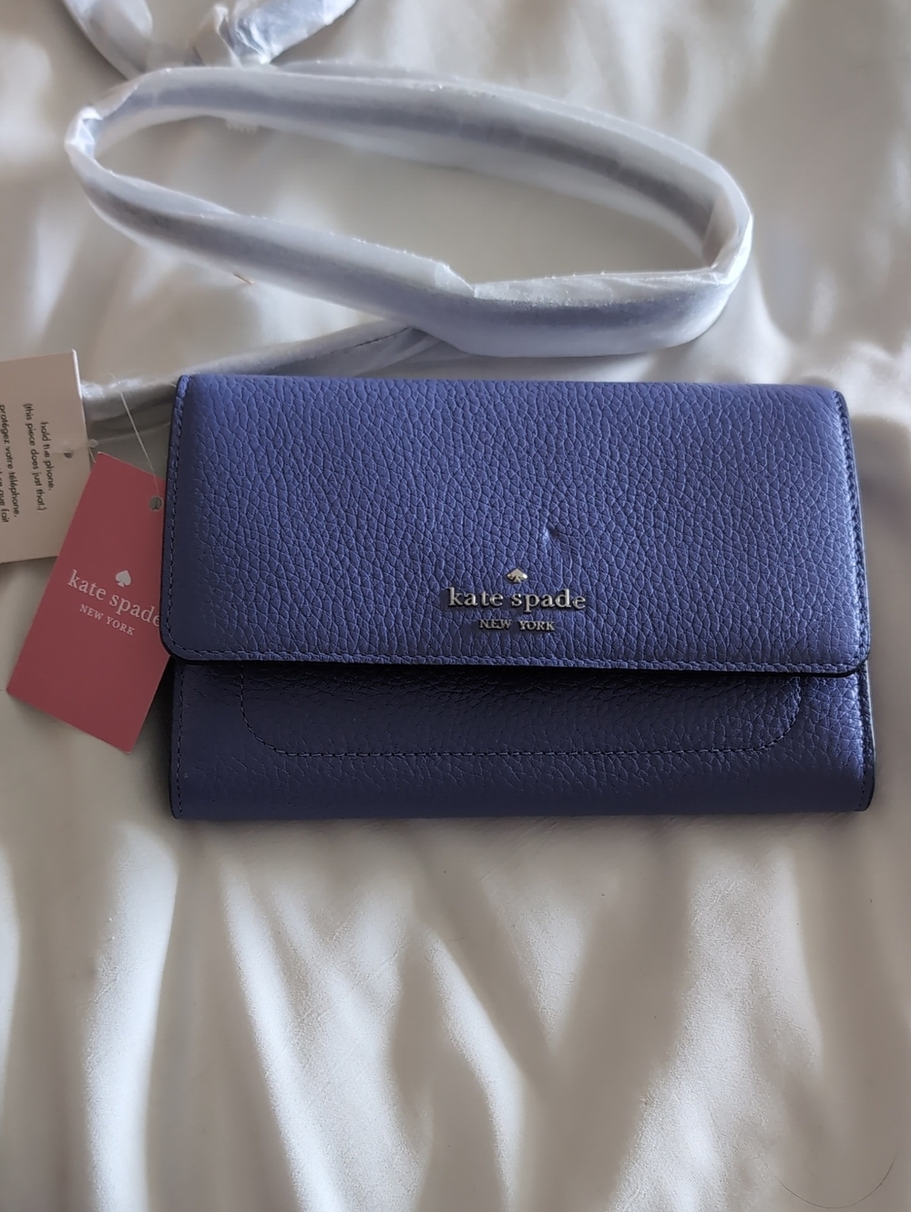 kate spade Periwinkle Pebbled Leather Crossbody Wallet with Silver Logo